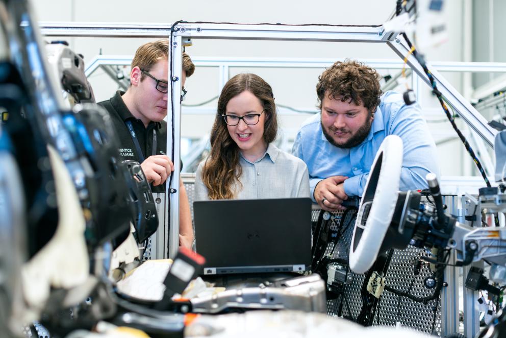 Group working in engineering lab