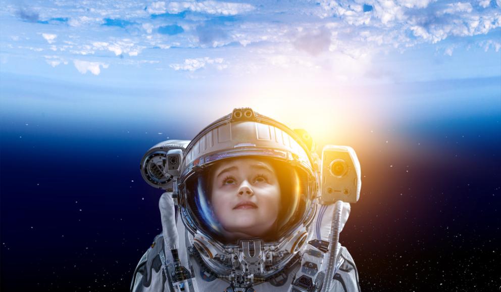 Image shows a child in a spacesuit 