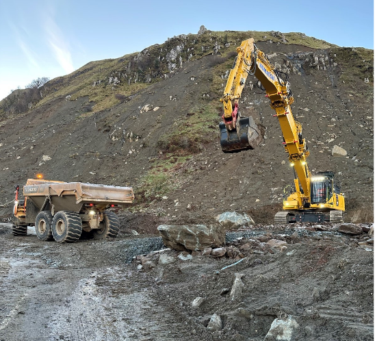 Digger and lorry