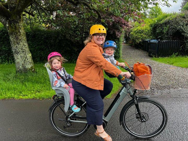 Mairi Queen from Helensburgh cycling to nursery with her two children onboard