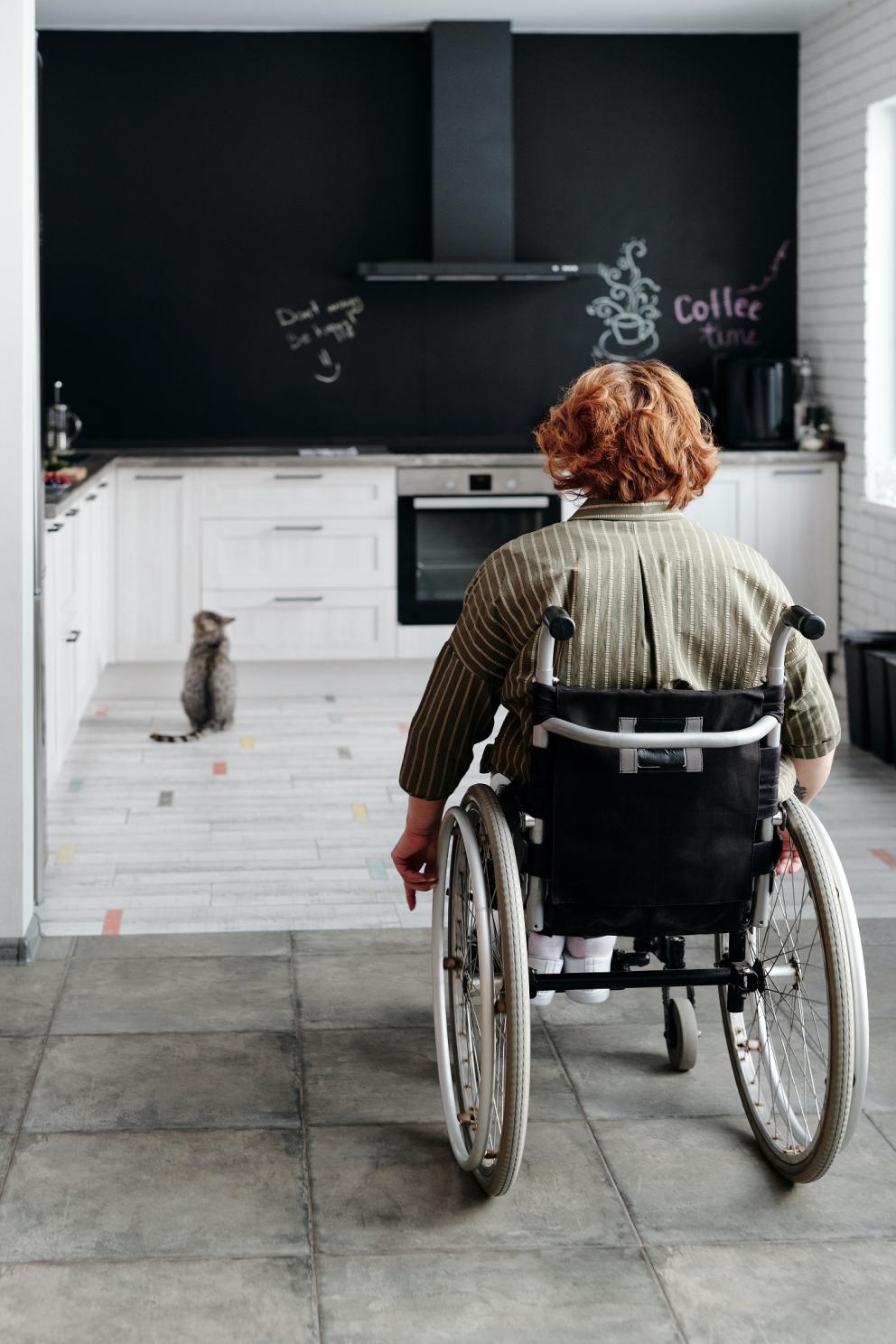 lady in wheelchair in kitchen