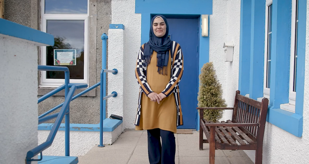 A piucture of Bute resident Rasha Rasho outside her place of work on the island