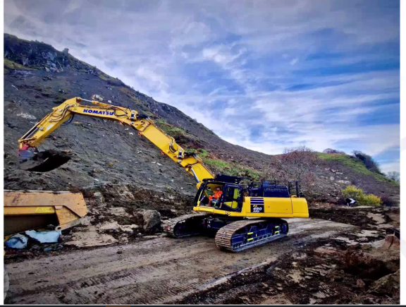 Ardfern landslip - work continues to clear 6,000 of debris from the road - clearing mud and boulders