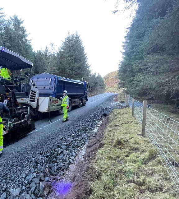 A816 landslip at Ardfern - 13th December - workers laying tarmac on the bypass road