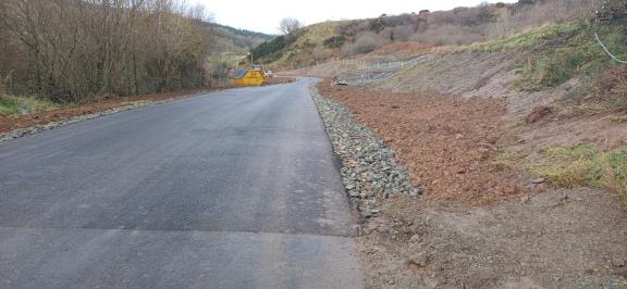 Looking south showing extent of road realignment and slope reprofiling and strengthening