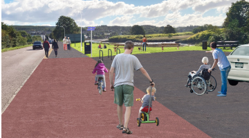 Image shows the proposed active travel route with different users. They include a male pushing his child on a balance bike, a cyclist and a lady pushing a wheelchair user. 