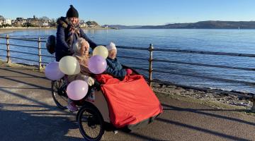 Cowal Befrienders volunteer Kate taking Kath and Mary our on the trishaw bike to celebrate Kath's 102nd birthday 