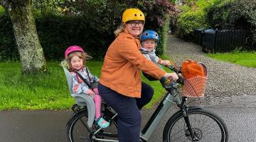 Mairi Queen from Helensburgh cycling to nursery with her two children onboard