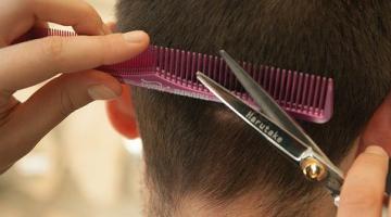 close up of man having a hair cut