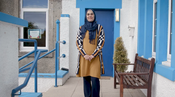 A piucture of Bute resident Rasha Rasho outside her place of work on the island