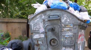 overflowing rubbish bin