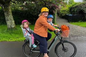 Mairi Queen from Helensburgh cycling to nursery with her two children onboard